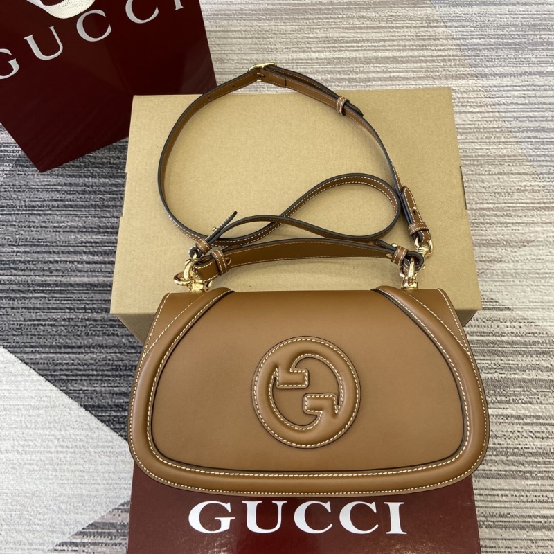 G*u*i top handle bags